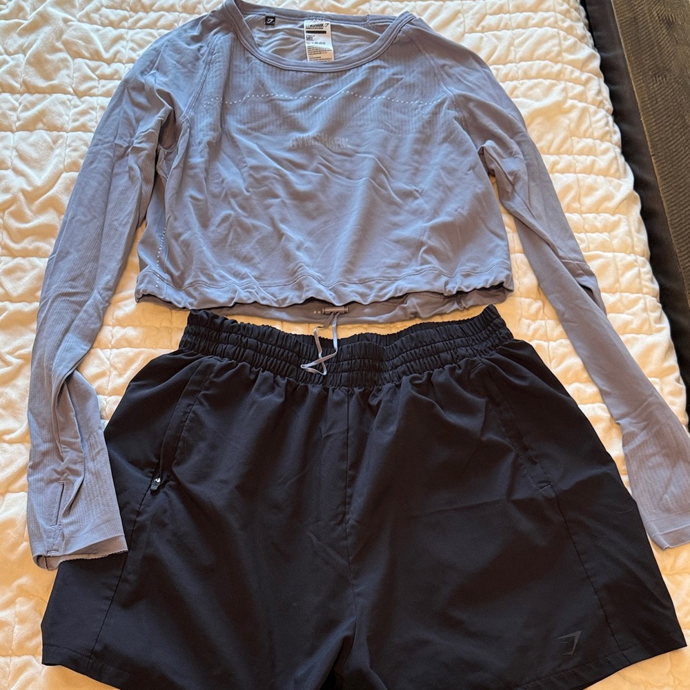 Gymshark Dusty Purple Performance Top and black shorts